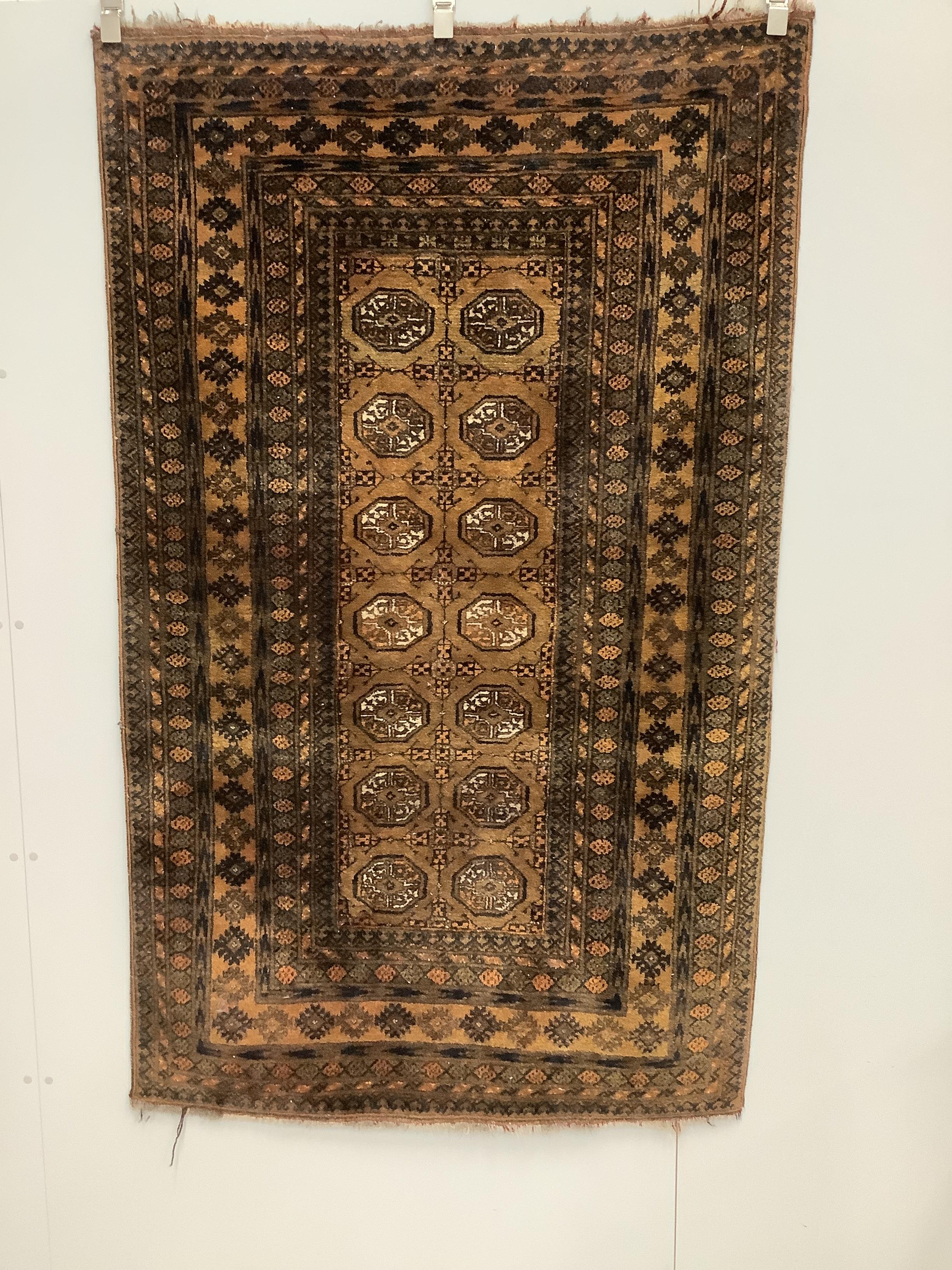 A Bokhara gold ground rug, 194 x 120cm
